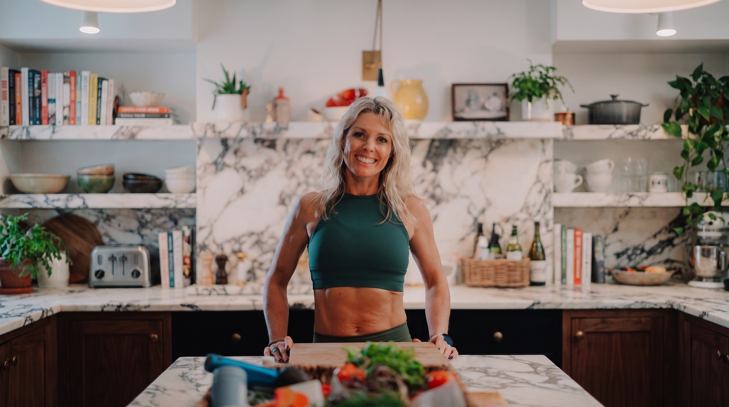 Emma Reeve in her kitchen preparing fresh food